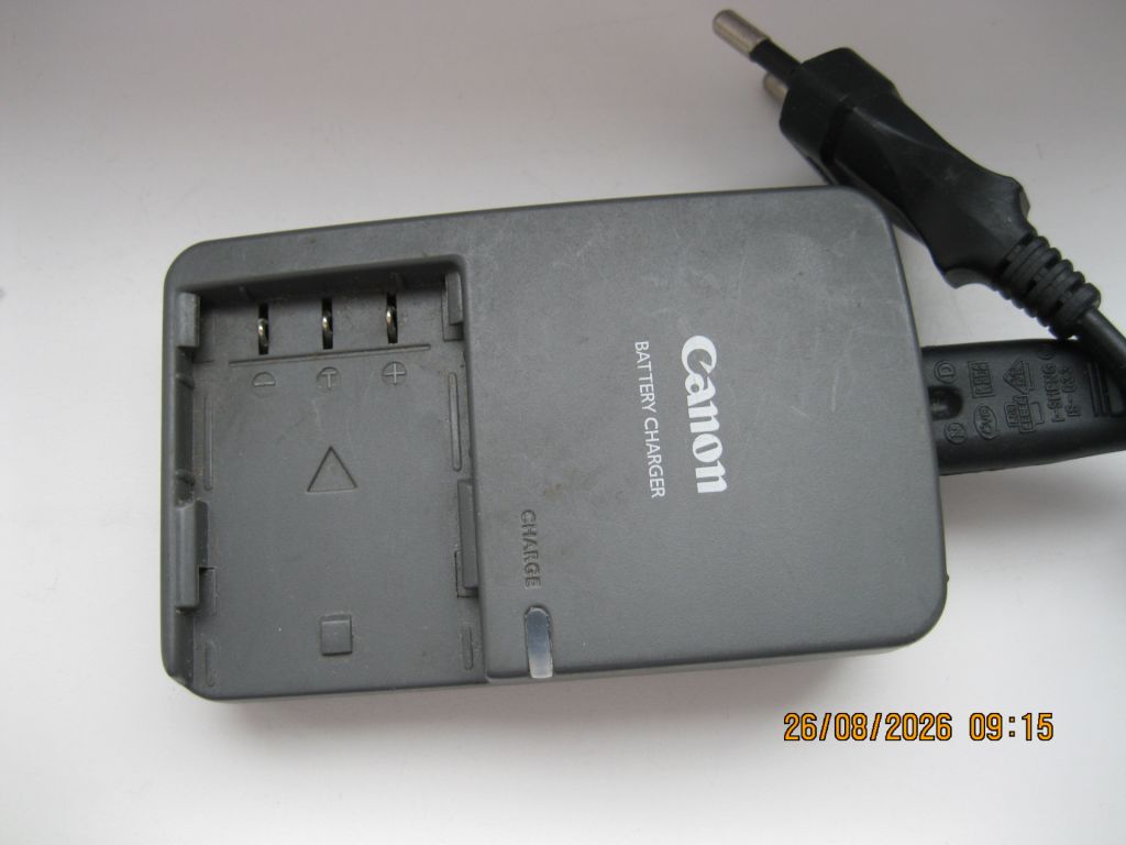Зарядка видеокамеры Canon cb-2lwe 8.4в 0,55а - фото фото фото 0