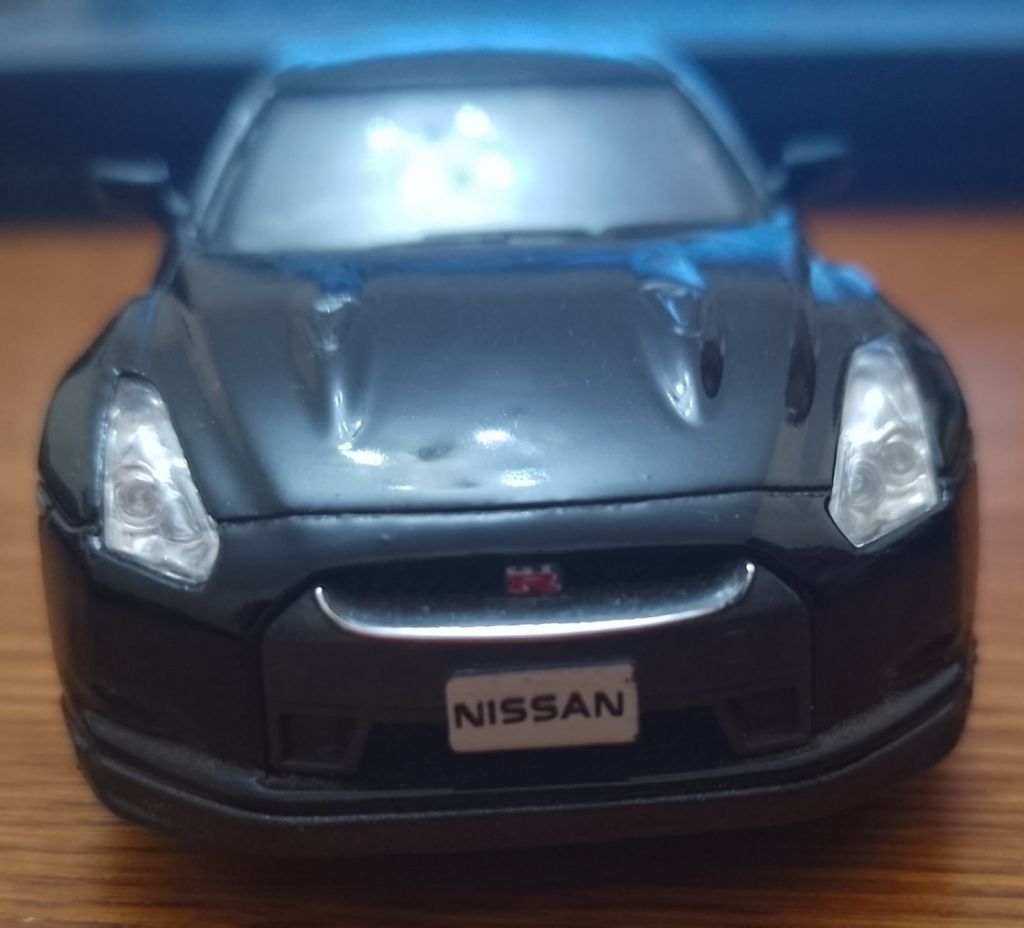 Модель 1:36 NISSAN G - R35, 2009 года. KINSMART - фото фото фото 0