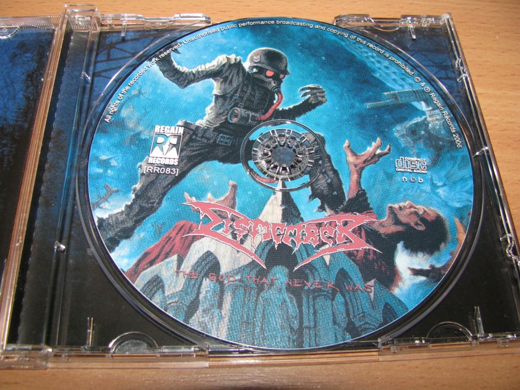 DISMEMBER - The God That Never Was  (2006 Regain 1st press) - фото фото фото 1