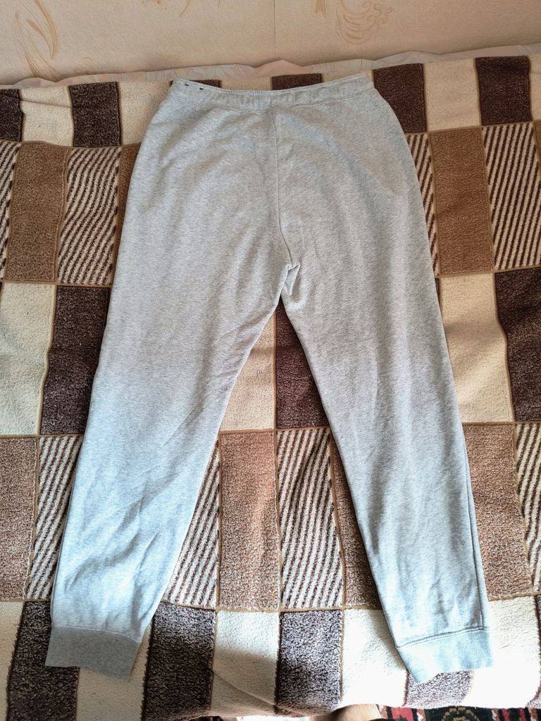 Штани спортивні Nike Rally Fleece Joggers - фото фото фото 2