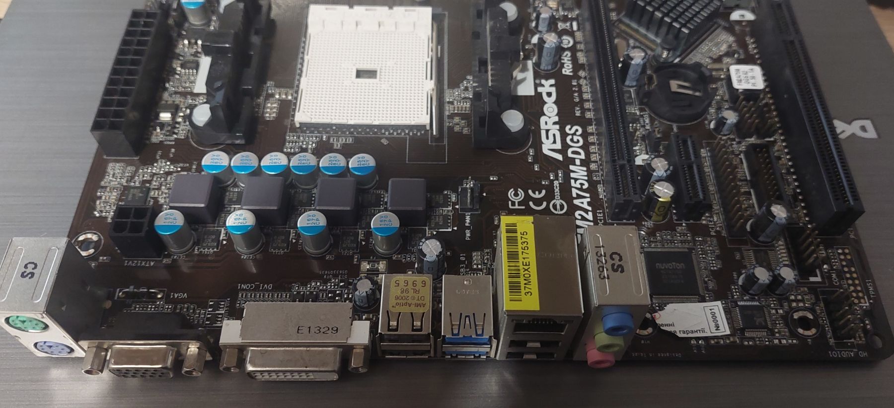 Б/В Материнська плата ASRock FM2A75M-DGS Socket FM2/MicroATX/2 x DDR3 - фото фото фото 1