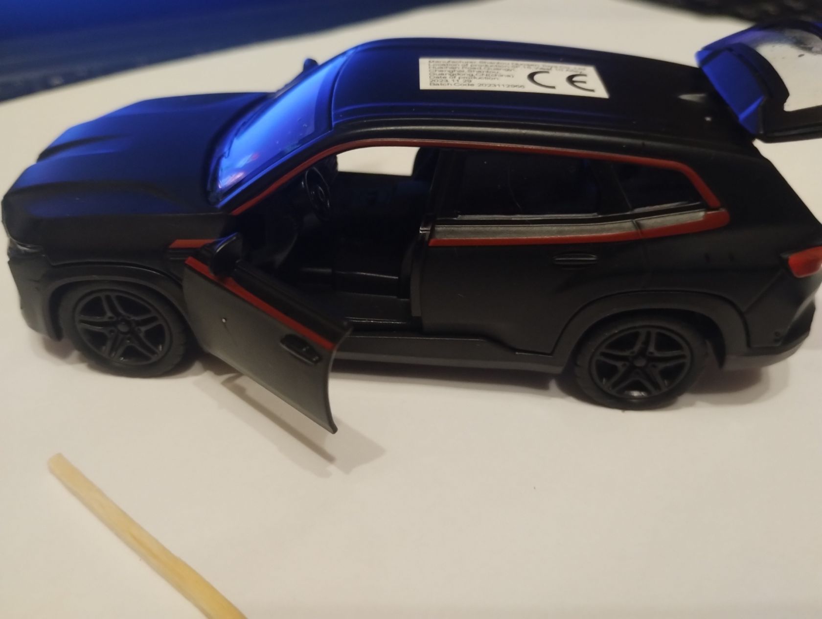 Іграшкова металева машинка, колекційна модель автомобиля BMW XM,  розмір 1/36 - фото фото фото 7