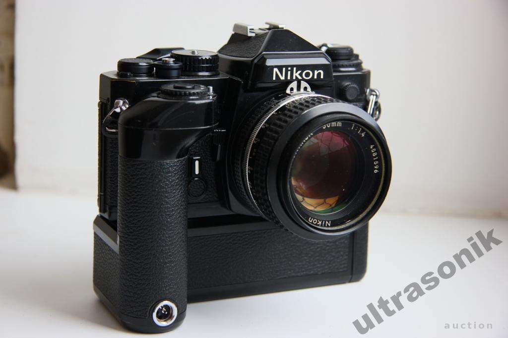 Пленочный фотоаппарат Nikon FE + Nikkor 50mm/1.4 Ф52mm + бустер MD-12 Japan Вживане - фото фото фото 4