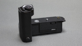 Вінтажні фотоапарати Винтажные фотоаппараты ^/--/^ Моторный привод Nikon MD-15 для плёночных фотокамер Nikon FA Вживане ^_^^^ моторний привід Nikon MD-15 для плівкових фотокамер Nikon FA - фото фото фото