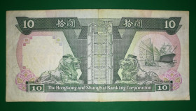 Китай Китай ^/--/^ Гонконг Hong Kong 10 доларів 1 січня 1987 нечастий рік випуску ^_^^^ Гонконг Hong Kong 10 долларов 1 января 1987 года нечастый год выпуска - фото фото фото