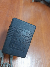 Зарядні пристрої Зарядные устройства ^/--/^ Блок живлення Panasonic зарядне 12 /--/ V 0.15 /--/ A LED #3 ^_^^^ Блок питания Panasonic зарядное 12 /--/ V 0.15 /--/ A LED #3 - фото фото фото