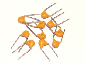 Конденсатори Конденсаторы ^/--/^ Конденсатор многослойный 100 pF 50 V ^_^^^ Конденсатор багатошаровий 100 pF 50 V - фото фото фото