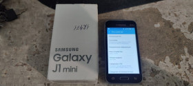Samsung Samsung ^/--/^ Мобильный телефон Samsung Galaxy J /--/ 1 Mini Black SM-J /--/ 105 /--/ H № 24260725 ^_^^^ Мобільний телефон Samsung Galaxy J /--/ 1 Mini Black SM-J /--/ 105 /--/ H No 24260725 - фото фото фото