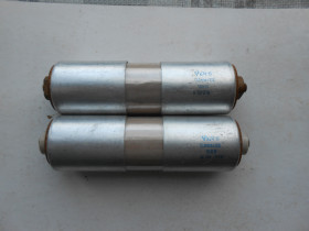Конденсатори Конденсаторы ^/--/^ Конденсатор.  К /--/ 74-6.  0,1 /--/ мкФ.  10 /--/ Кв. 10000 /--/ в. ^_^^^ Конденсатор. К /--/ 74-6. 0,1 /--/ мкФ 10 /--/ Кв. - фото фото фото