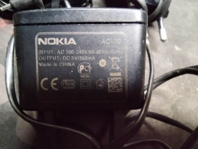 Зарядні пристрої Зарядные устройства ^/--/^ Зарядка на Nokia AC-15 тонкий штекер - фото фото фото