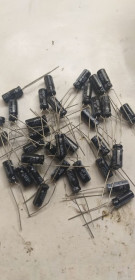 Конденсатори Конденсаторы ^/--/^ Конденсатор электролитический 1 мкф 50 V-ЛОТ-50 шт ^_^^^ Конденсатор електролітичний 1 мкф 50 V-ЛОТ-50 шт - фото фото фото