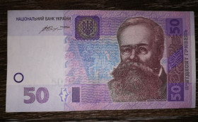 Загальнодержавні випуски Общегосударственные выпуски ^/--/^ 50 гривень 2014 Гонтарева ФВ зі штрихами на стрічці. ^_^^^ 50 гривен 2014 Гонтарева ФВ со штрихами на ленте. - фото фото фото