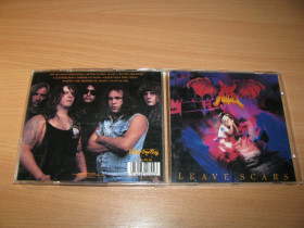 Музичні диски Музыкальные диски ^/--/^ DARK ANGEL - Leave Scars  (1989 Under One Flag 1 /--/ st press,UK) ^_^^^ DARK ANGEL - Leave Scars (1989 Under One Flag 1 /--/ st press, UK) - фото фото фото