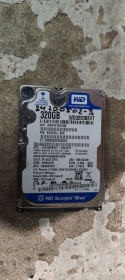 Жорсткі диски Жесткие диски ^/--/^ Жесткий диск для ноутбука 320 Gb / Гб Western Digital Scorpio Blue WD /--/ 3200 /--/ BEVT 2.5 SATA /--/ 2 № 24200502 ^_^^^ Жорсткий диск для ноутбука 320 Gb / Гб Western Digital Scorpio Blue WD /--/ 3200 /--/ BEVT 2.5 SATA /--/ 2 No 24200502 - фото фото фото