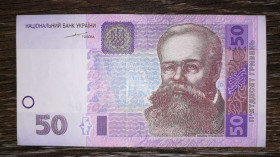 Загальнодержавні випуски Общегосударственные выпуски ^/--/^ 50 гривень ₴ 2004 Тігіпко серія ЄЙ. ^_^^^ 50 гривен ₴ 2004 Тигипко серия ЕЙ. - фото фото фото