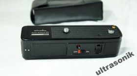 Вінтажні фотоапарати Винтажные фотоаппараты ^/--/^ Моторный привод Minolta Auto Winder D для камер XD XD-s XD-5 XD-7 XD-1 Вживане ^_^^^ моторний привід Minolta Auto Winder D для камер XD XD-s XD-5 XD-7 XD-1 - фото фото фото