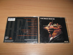Музичні диски Музыкальные диски ^/--/^ SACRED REICH - Heal  (1996 Metal Blade 1 /--/ st press,USA) ^_^^^ SACRED REICH - Heal (1996 Metal Blade 1 /--/ st press,USA) - фото фото фото