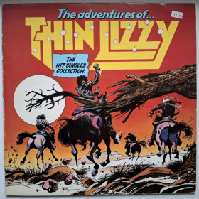 Платівки Пластинки ^/--/^ Thin Lizzy EX Gary Moore - The Hit Singles Collection - 1972-80.   (LP). 12. Vinyl. Пластинка. UK. ^_^^^ Thin Lizzy EX Gary Moore - The Hit Singles Collection - 1972-80. 12.Vinyl. Пластинка. UK. - фото фото фото