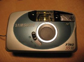 Вінтажні фотоапарати Винтажные фотоаппараты ^/--/^ Фотоаппарат Samsung fino /--/ 35 /--/ se ^_^^^ Фотоапарат Samsung fino /--/ 35 /--/ se - фото фото фото