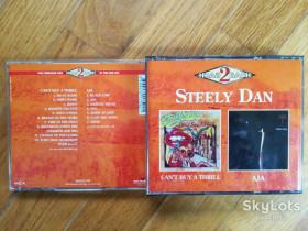 Музичні диски Музыкальные диски ^/--/^ Steely Dan-Can&amp;apos;t buy a thrill, AJA-Австралия-2 части-состояние: 4+ ^_^^^ Steely Dan-Can&amp;apos;t buy a thrill, AJA-Австралія-2 частини-стан: 4+ - фото фото фото