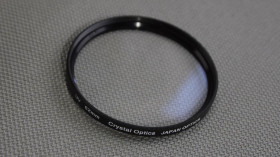 Світлофільтри Светофильтры ^/--/^ Crystal Optics UV 62 /--/ mm защитный ультрафиолетовый светофильтр 100% оригинал Japan Вживане ^_^^^ Crystal Optics UV 62 /--/ mm захисний ультрафіолетовий світлофільтр 100% оригінал Japan - фото фото фото