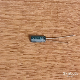 Конденсатори Конденсаторы ^/--/^ 4,7 /--/ мкФ 63 /--/ В.  Samsung 85°C ^_^^^ 4,7 мкФ 63 /--/ В. Samsung 85°C - фото фото фото