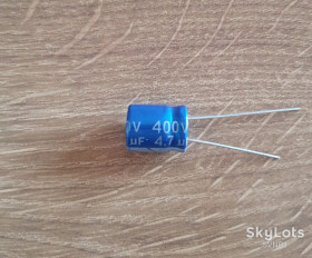 Конденсатори Конденсаторы ^/--/^ 4,7 /--/ мкФ 400 /--/ В.  JB  105°C ^_^^^ 4,7 мкФ* 400 /--/ В. JB 105 °C - фото фото фото