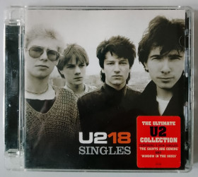 Музичні диски Музыкальные диски ^/--/^ CD U /--/ 2 ‎– U /--/ 2 18 Singles       (2006, Mercury ‎602517135420, Matr 06025 171 354-2 01, Germany) ^_^^^ CD U /--/ 2 – U /--/ 2 18 Singles (2006, Mercury 602517135420, Matr 06025 171 354-2 01, Germany) - фото фото фото