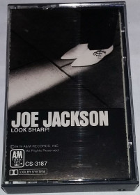Касети Кассеты ^/--/^ JOE JACKSON  Look Sharp!. Cassette US ^_^^^ JOE JACKSON Look Sharp! Cassette US - фото фото фото
