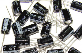 Конденсатори Конденсаторы ^/--/^ Конденсатор электролитический 100 мкФ х 50 /--/ В ^_^^^ Конденсатор електролітичний 100 мкФ х 50 /--/ В - фото фото фото