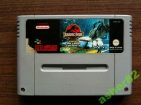 Диски з відеоіграми Диски с видеоиграми ^/--/^ Игра на Super Nintendo SNES &amp;quot;Jurassic Park Part 2: The Chaos Continues&amp;quot;      (PAL) ^_^^^ Гра на Super Nintendo SNES &amp;quot;Jurassic Park Part 2: The Chaos Continues&amp;quot; (PAL) - фото фото фото