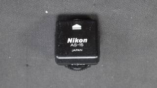 Адаптери Адаптеры ^/--/^ Nikon AS-15 универсальный  башмак-адаптер с центральным контактом и гнездом с синхроконтака для выносной вспышки Japan Вживане ^_^^^ Nikon AS-15 універсальний башмак-адаптер з центральним контактом і гом з синхроконтака для виносного спалаху - фото фото фото