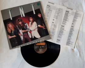 Платівки Пластинки ^/--/^ TNT - Tell No Tales - 1987.  (LP). 12. Vinyl. Пластинка. Holland. ^_^^^ TNT - Tell No Tales - 1987. (LP). 12. Vinyl. Платівка. Holland. - фото фото фото