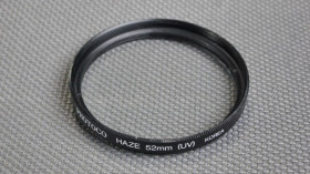 Світлофільтри Светофильтры ^/--/^ PhotoCo Haze UV 52 /--/ мм. защитный ультрафиолетовый светофильтр 100% оригинал Korea Вживане ^_^^^ PhotoCo Haze UV 52 /--/ мм. захисний ультрафіолетовий світлофільтр 100% оригінал Korea - фото фото фото