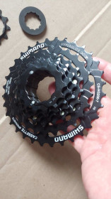 Ланцюги, зірки, тріскачки Цепи, звезды, трещетки ^/--/^ Кассета Shimano CS-HG /--/ 200, 12-32 /--/ T, 7 скоростей speed новая ^_^^^ Кассета Shimano CS-HG /--/ 200, 12-32 /--/ T, 7 швидкостей speed нова - фото фото фото