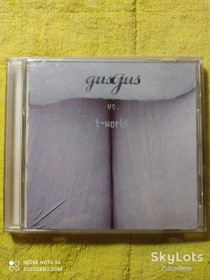 Музичні диски Музыкальные диски ^/--/^ CD   GusGus vs. T-world – GusGus vs. T-world 2000 ^_^^^ CD GusGus vs. T-world - GusGus vs. T-world 2000 - фото фото фото
