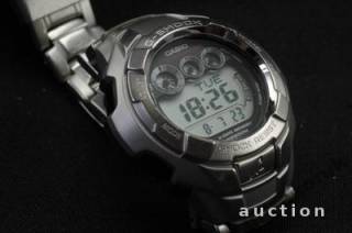 Наручні годинники Наручные часы ^/--/^ Годинник CASIO G-Shock серые 200 /--/ m WR G-7100 /--/ D 2831 корпус нержавейка Вживане ^_^^^ CASIO G-Shock сірі 200 /--/ m WR корпус нержавійка - фото фото фото