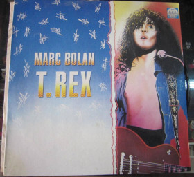 Платівки Пластинки ^/--/^ Платівка. Група T. Rex. Марк Бо́лан. 1991 р. R /--/ 60 005505 ^_^^^ Пластинка. Группа T. Rex. Марк Болан. 1991 г. R /--/ 60 005505 - фото фото фото