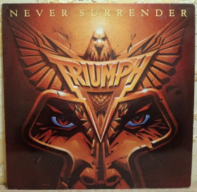 Платівки Пластинки ^/--/^ Triumph - Never Surrender - 1983.  (LP). 12. Vinyl. Пластинка. Germany. ^_^^^ Triumph — Never Surrender — 1983. 12.Vinyl. Пластинка. Germany. - фото фото фото