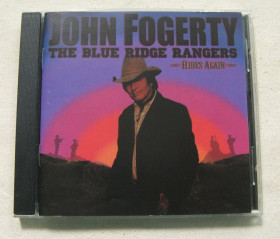 Музичні диски Музыкальные диски ^/--/^ CD Creedence Clearwater Revival Family. John Fogerty. The Blue Ridge Rangers Rides Again. 2009 ^_^^^ CD Creedence Clearwater Revival Family. John Fogerty. Blue Ridge Rangers Rides Again. 2009 2009 2009 - фото фото фото