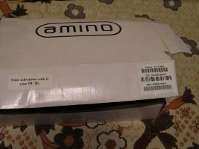 Декодери, тюнери Декодеры, тюнеры ^/--/^ Приставка для IPTV Amino AmiNET с пультами ^_^^^ Приставка для IPTV Amino AmiNET з пультами - фото фото фото