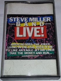 Касети Кассеты ^/--/^ STEVE MILLER BAND  Live!  Cassette    (US) ^_^^^ Steve Miller Band Live! Cassette (US) - фото фото фото