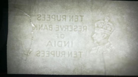 Індія Индия ^/--/^ Индия 10 рупий 1937 бумага с затонувшего корабля. ^_^^^ Індія 10 рупій 1937 папір із затонулого корабля. - фото фото фото