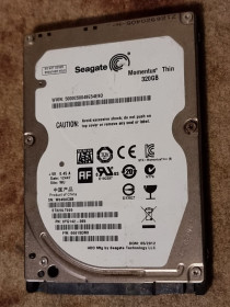 Жорсткі диски Жесткие диски ^/--/^ 80% hdd 2.5 320 гб seagate 5400 62.8/65.7 жесткий диск st /--/ 320 /--/ lt /--/ 020-9 /--/ yg /--/ 142 сигейт 7 /--/ mm slim 7 /--/ мм слим - фото фото фото