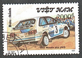 Транспорт Транспорт ^/--/^ Вьетнам  (1991) Раллийные автомобили. Maздa 323 ^_^^^ В'єтнам (1991) ралійні автомобілі. Mazda 323 - фото фото фото