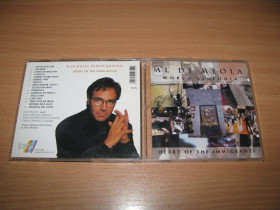 Музичні диски Музыкальные диски ^/--/^ AL DI MEOLA - World Sinfonia - Heart Of The Immigrants  (1998 Inak, Germany) ^_^^^ AL DI MEOLA - World Sinfonia - Heart Of The Immigrants (1998 Inak, Germany) - фото фото фото